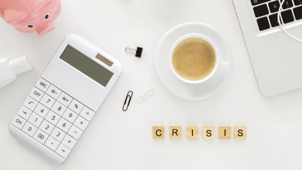 crisis-word-made-with-wooden-cubes-financial-elements