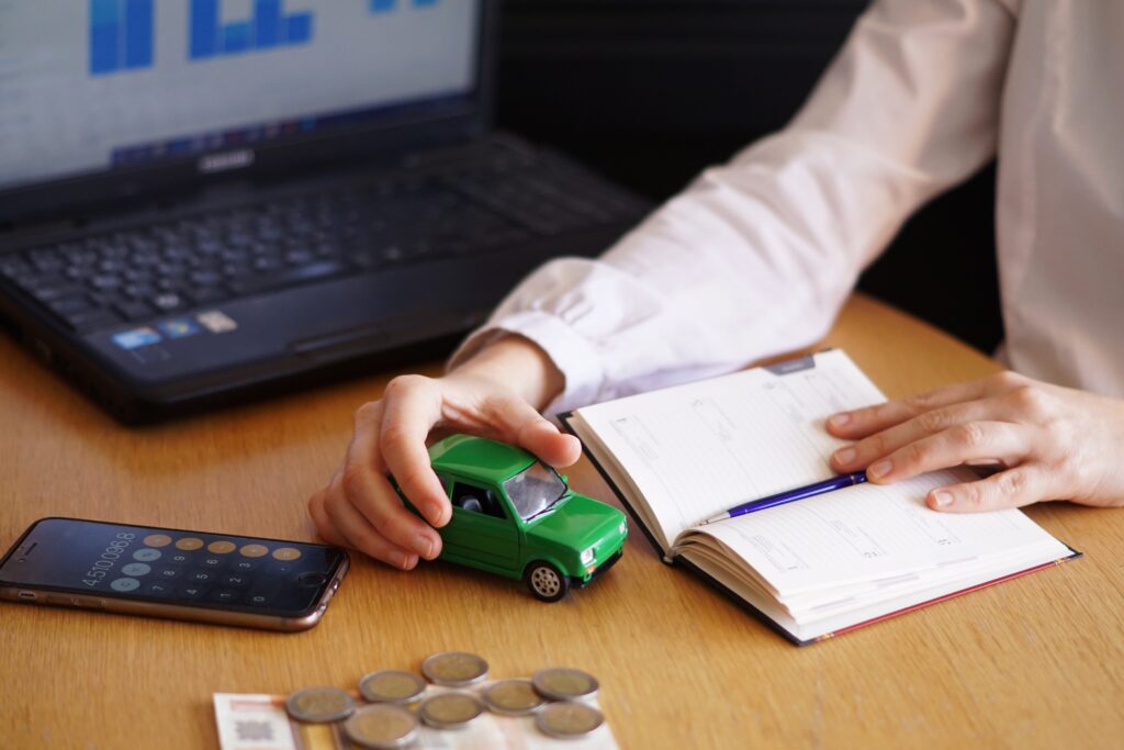 Fleet owner reviewing logistics tax compliance documents and regulations
